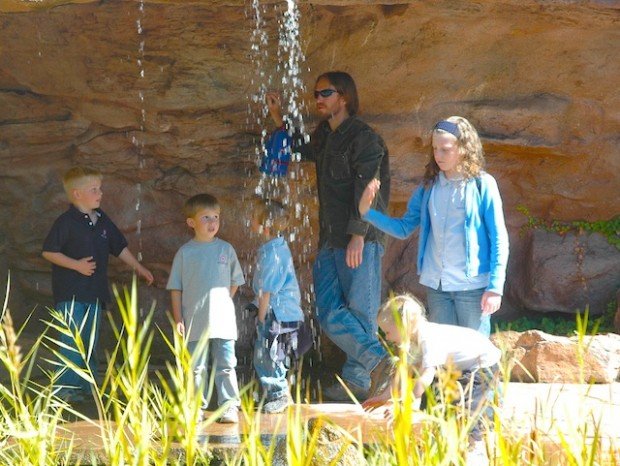 There is Steve hanging with the kids (like he always did). We love this photo because Eli is so excited to talk to him.